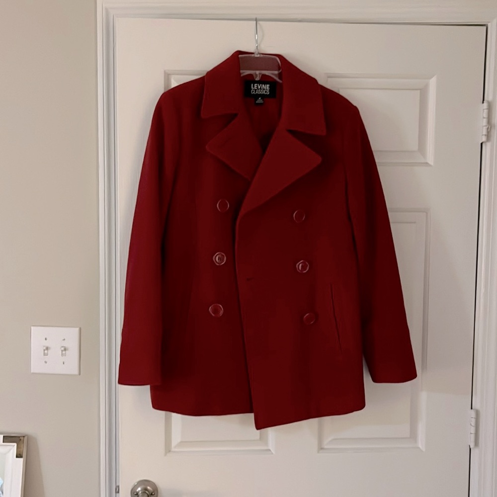Beautiful red peacoat. New without tags. Never worn.